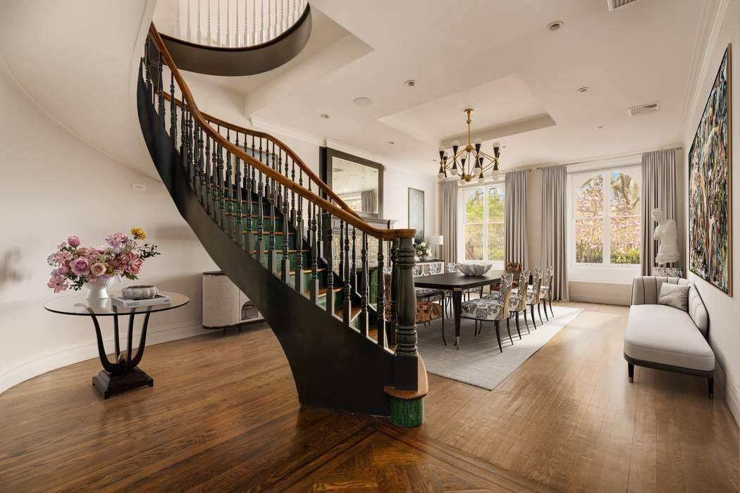 Welcome to this extraordinary 28 foot wide townhouse, perfectly positioned with a centerline view spanning over the serene Stuyvesant Square Park.