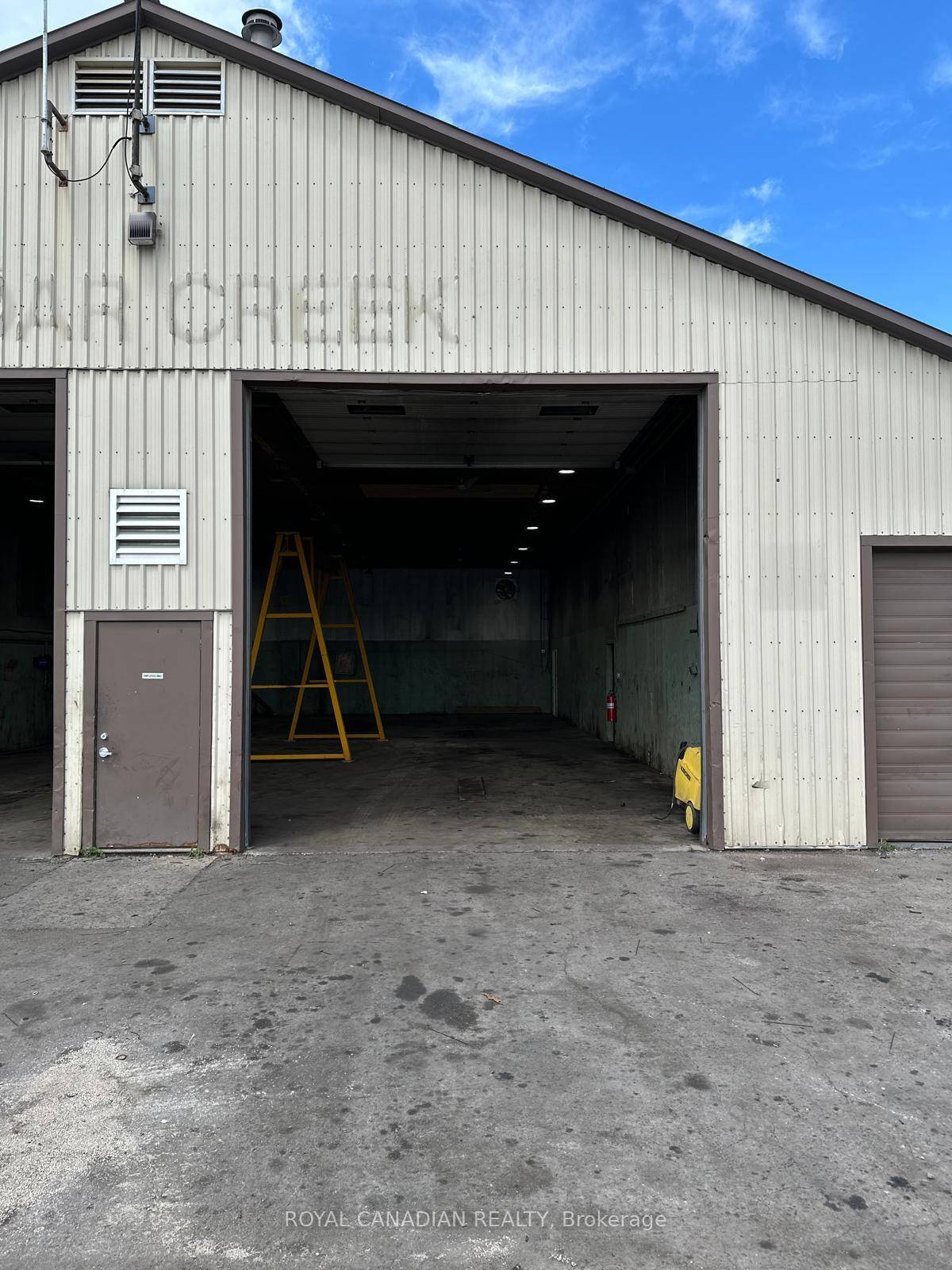 9. 41 Acres Land parcel with Very spacious building in the heart of a rapidly growing area with Drive in doors Truck Trailer repair shop and some extra office space ...