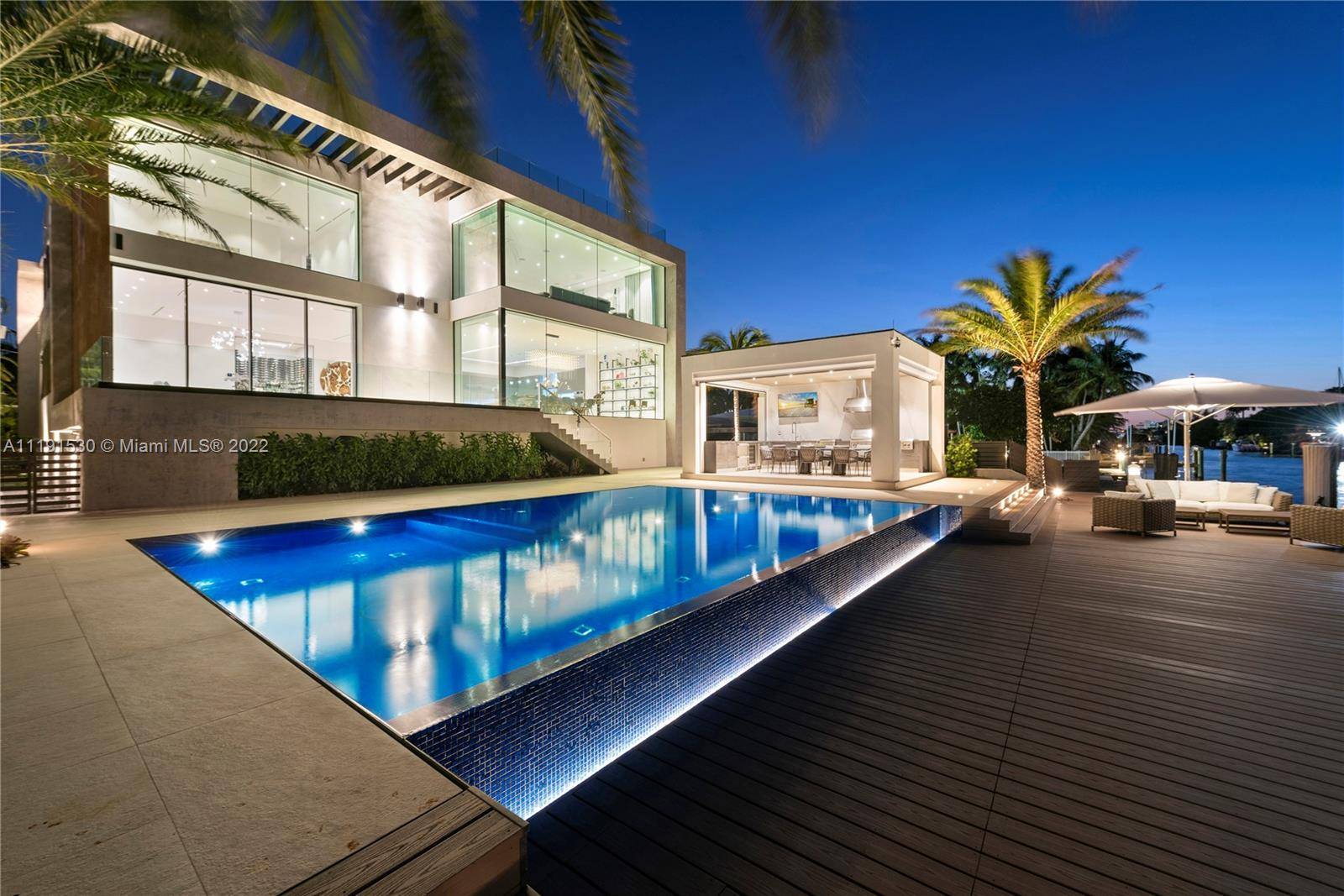 Available July 1st. Located bayfront on the double gated Belle Meade Island, this 4 level new construction is a symbol of modern opulence.