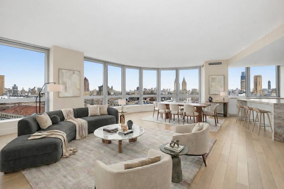 This beautifully proportioned four bedroom, four and a half bath residence is defined by light, openness, and sweeping views across the Upper West Side.