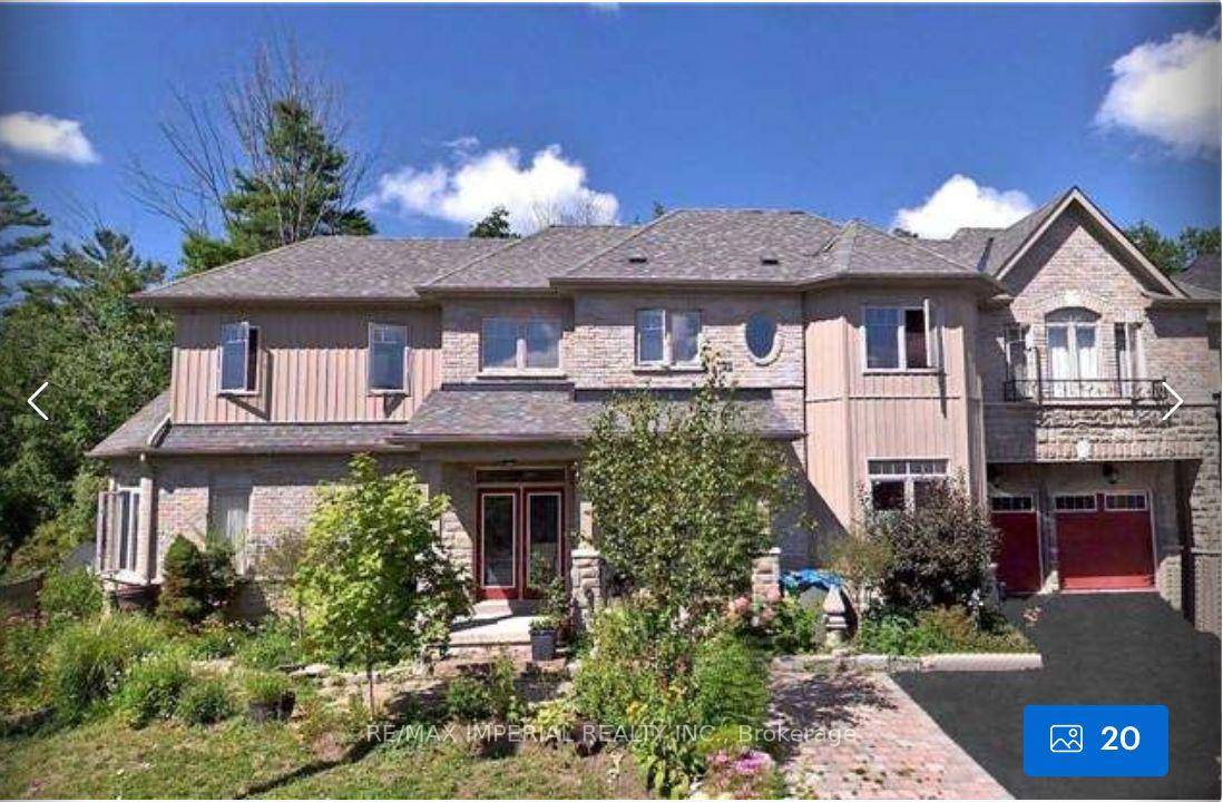 Nestled in the prestigious Woodland Hill community of Newmarket, this stunning detached home boasts a rare premium ravine lot with only one adjacent neighbor, offering exceptional privacy and serene natural ...