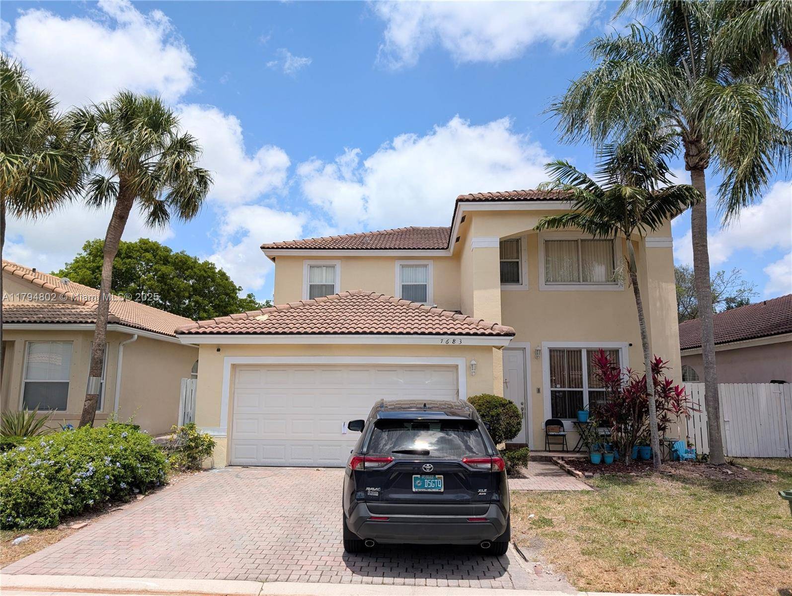 Spacious 5 bed 3 bath home with a 2 car garage in a gated community in Pembroke Pines.