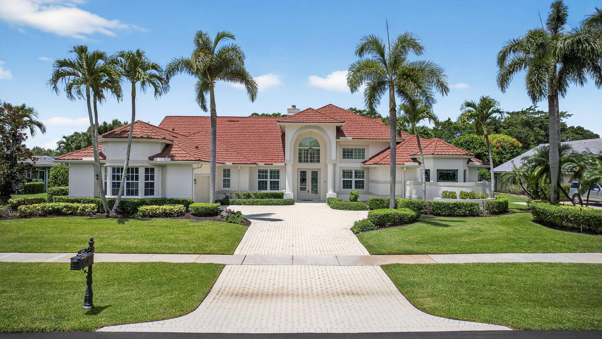 Welcome to this beautifully upgraded and impecably maintained home in the heart of Wellington, with low HOA fees, and top tier features throughout.