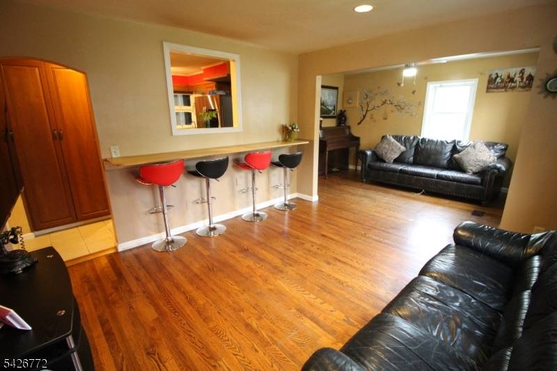 Discover the space and versatility of 199 Finderne Ave, offering 5 bedrooms, 2 full bathrooms, plus a dedicated office.