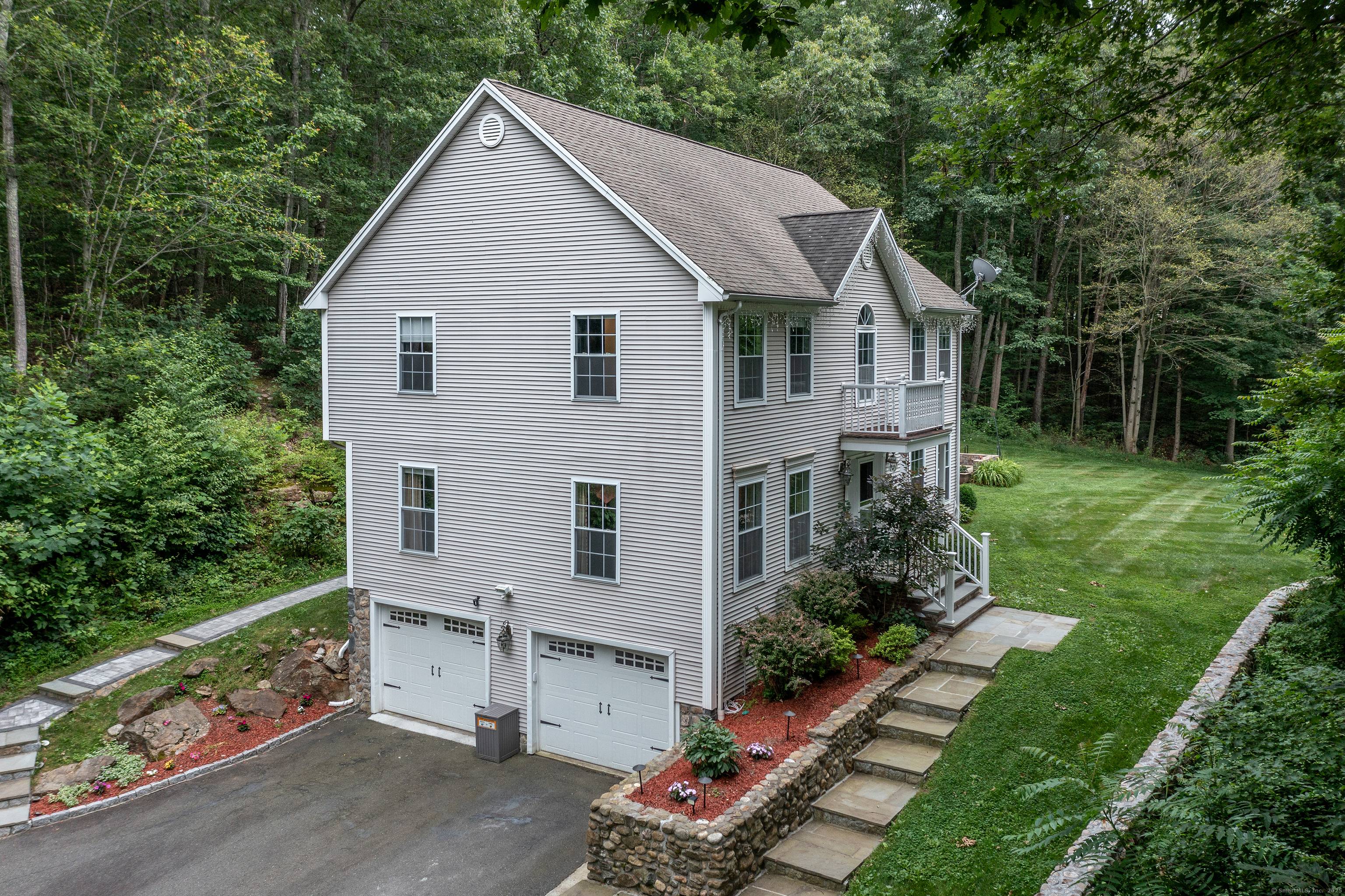 Nestled within a serene, private cul de sac in the heart of Southbury, this meticulously maintained 4 bedroom, 2.