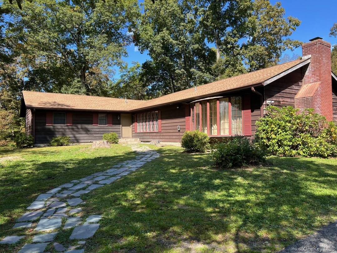 Lots of potential for this spacious country Ranch on over 5 acres.