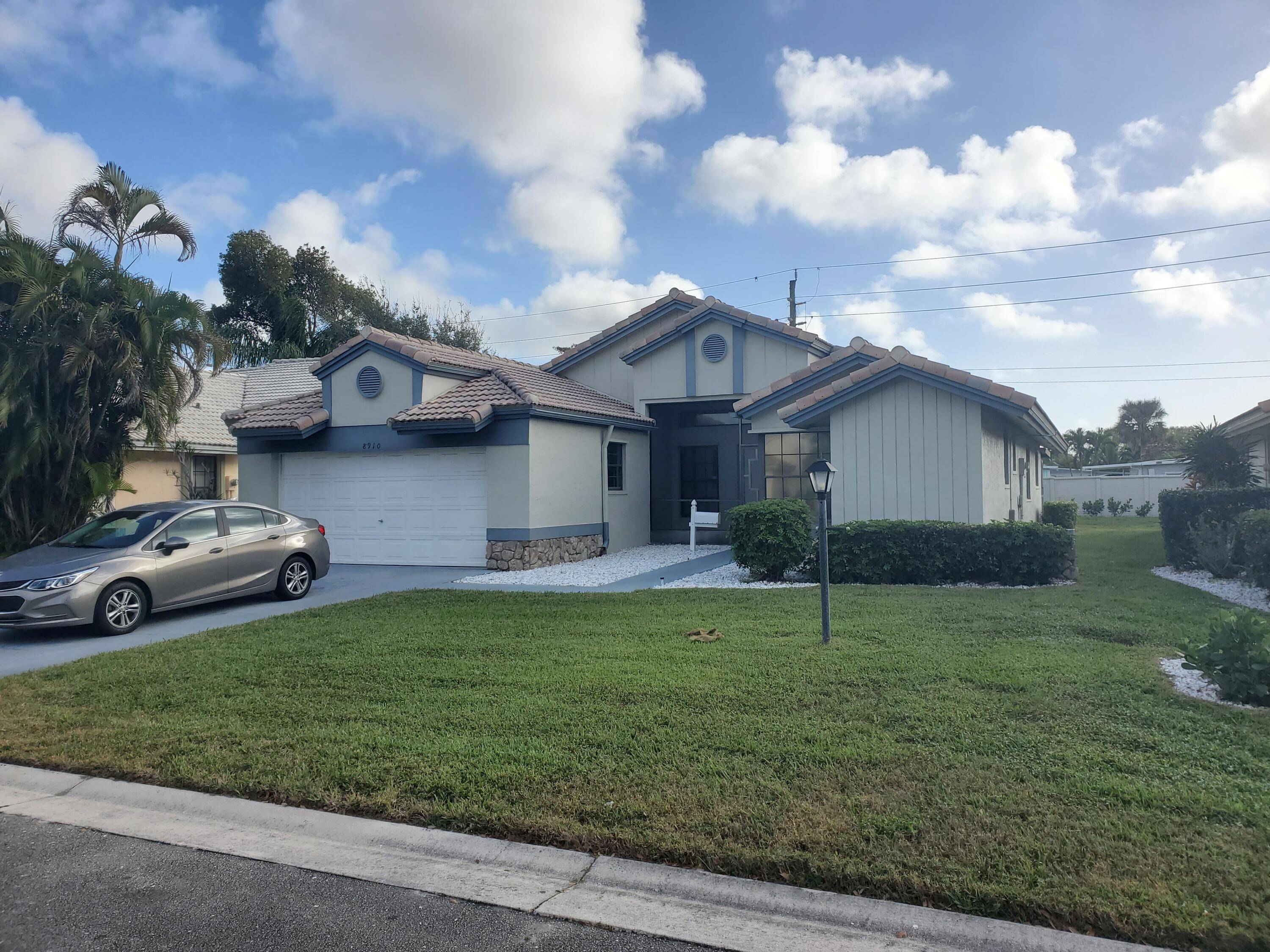 55 3 bedroom two bath home in Boynton Beach, Florida active adult community completely move and ready Nice clubhouse, with a gym huge swimming pool.