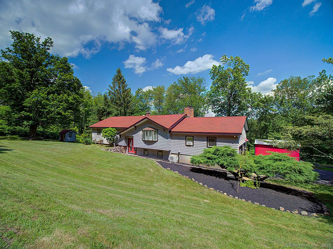 Welcome to This Charming Raised Ranch in the heart of Hamden, CT.