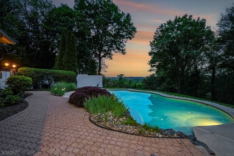 Perfectly situated on a premier 6 acre lot in prestigious Beacon Hill, this elegant Georgian Colonial offers breathtaking views.