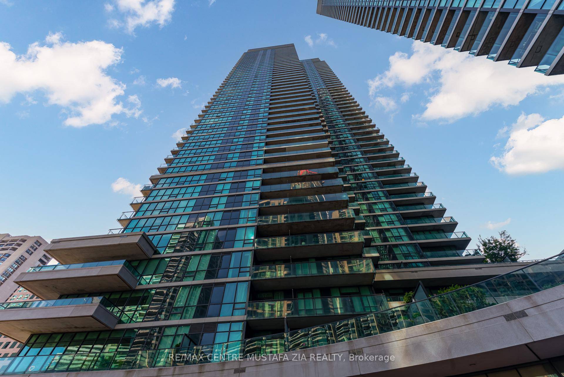 Welcome to 33 Bay St, Breathtaking views of Lake Ontario enhance this beautifully designed residence, featuring a functional layout with an open balcony and floor to ceiling windows that fill ...