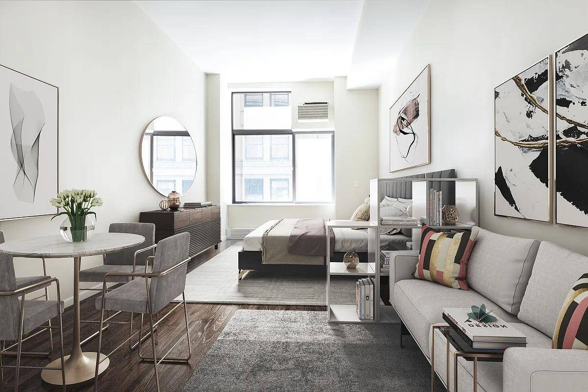 Newly renovated, spacious duplex loft with a sprawling 27 ft long living room which enjoys a flexible layout with southern exposure !