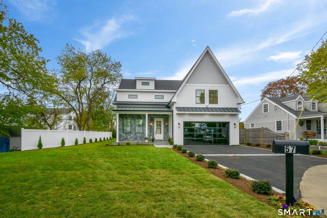 Nestled at the end of a peaceful cul de sac on a level lot, this exceptional 5, 000 Square foot, 5 bedroom, 5.