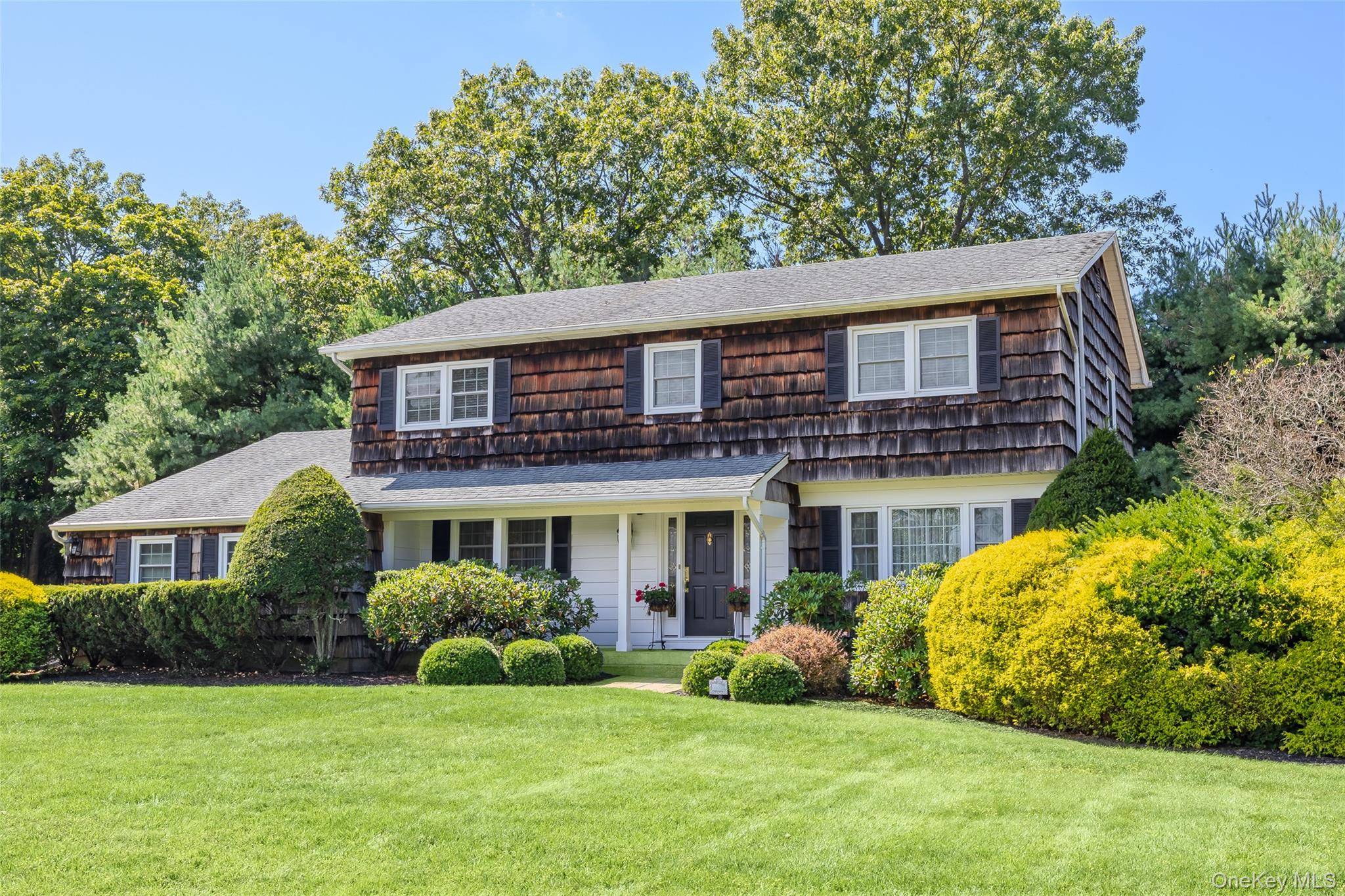Nestled in a prime location bordered by Setauket Harbor this Picture Perfect Center Hall Colonial is close to all yet a world away !