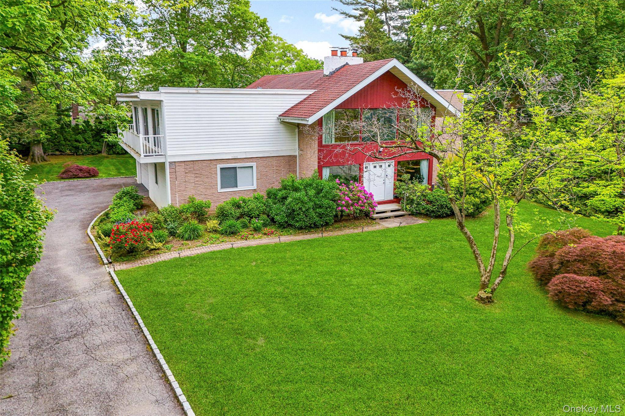 This stunning Mid Century Modern residence is ideally situated on one of the most prestigious and picturesque streets in the New Rochelle Scarsdale Post Office Estate area.
