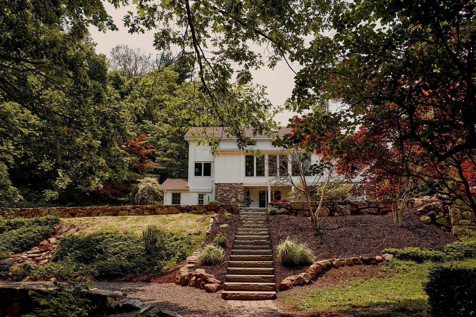 Welcome to the Cornwall on Hudson Trailhead ; an expansive 4 bed, 3 bedroom home in a beautiful wooded 3 acre setting with terraced bluestone walkways, a fire pit, and ...
