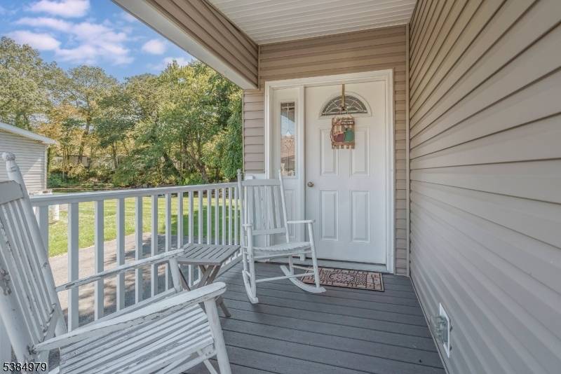 Turn Key Main Level Lakefront Living Title Ownership Land Lease Lakefront Setting Central Air Living Room Kitchen with large pantry Two Bedrooms Two Full Bathrooms Front Porch Large Rear Deck ...
