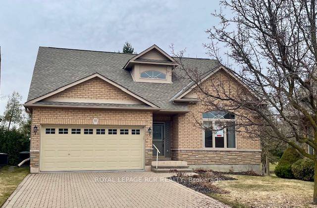 Welcome home to 10 Forest Link a spacious bungaloft backing onto a beautiful golf course location in Briar Hill.