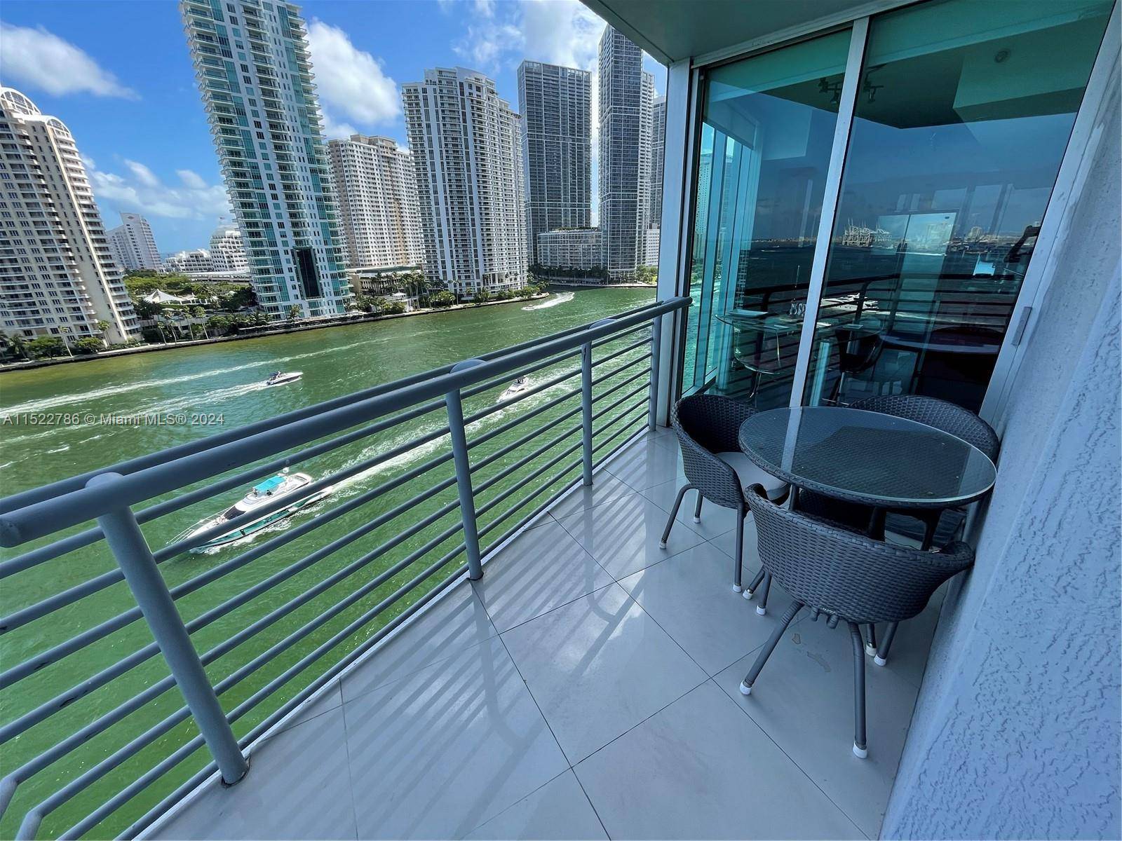 CORNER UNIT WITH UNOBTRUCTED WATER VIEWS, RARELY AVAILABLE AT ONE MIAMI 09 LINE.