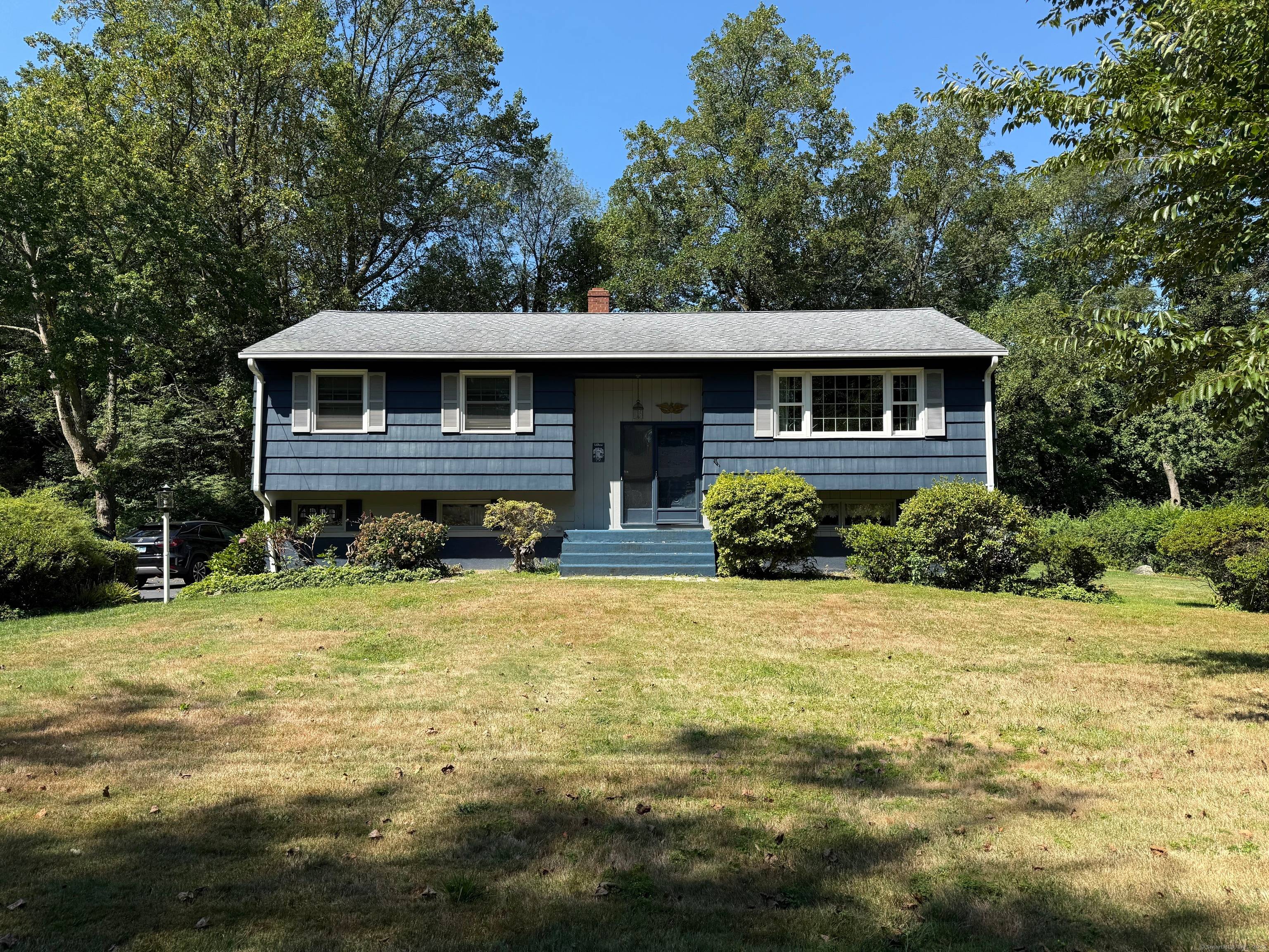 Welcome to this charming raised ranch in the heart of Trumbull !