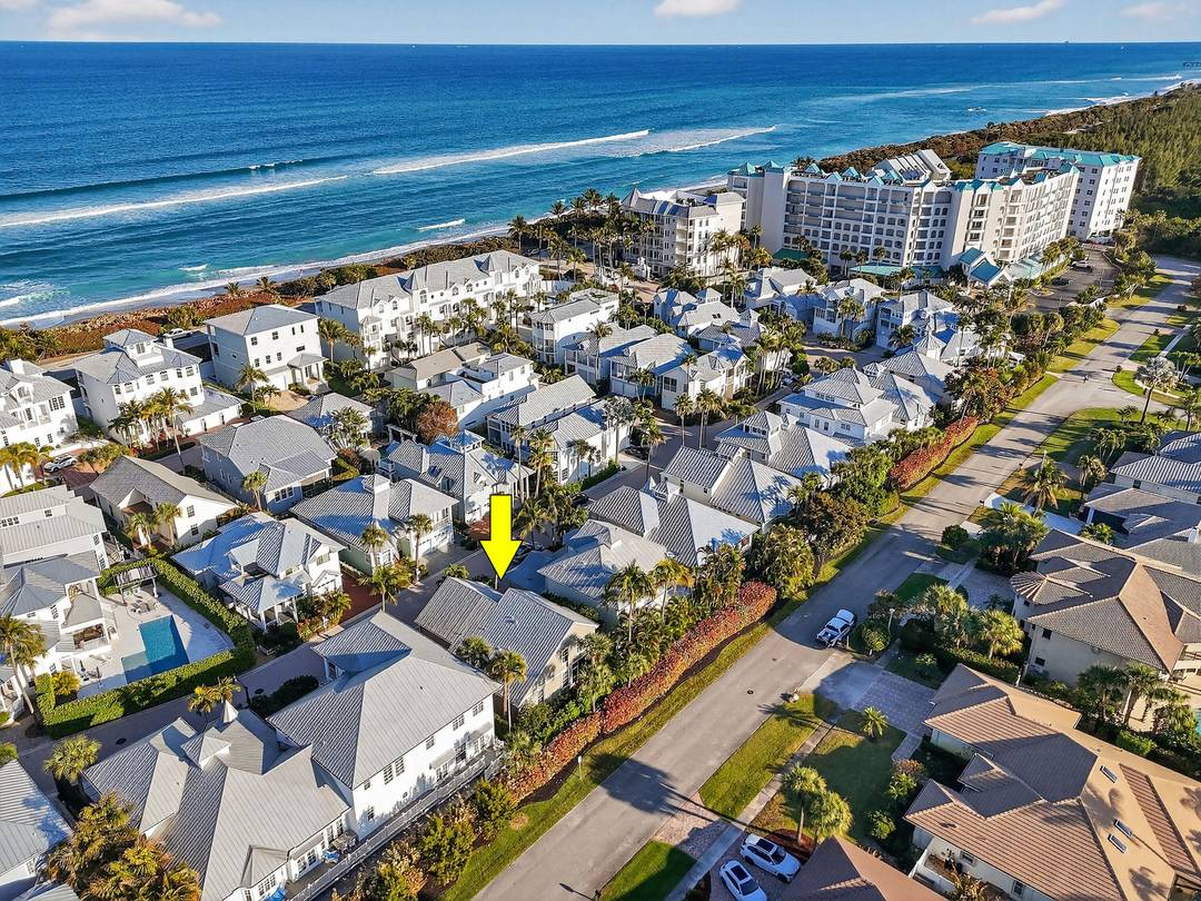 Tucked within the intimate, gated seaside enclave of Jupiter Key, just steps from the Atlantic shoreline, this Key West style residence offers a rare opportunity to own within one of ...