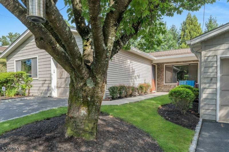 Tucked away in a quiet, private enclave of West Orange is this rare 3 Bedroom, 2 Bath Ranch Condo in Briar Hill Villas.