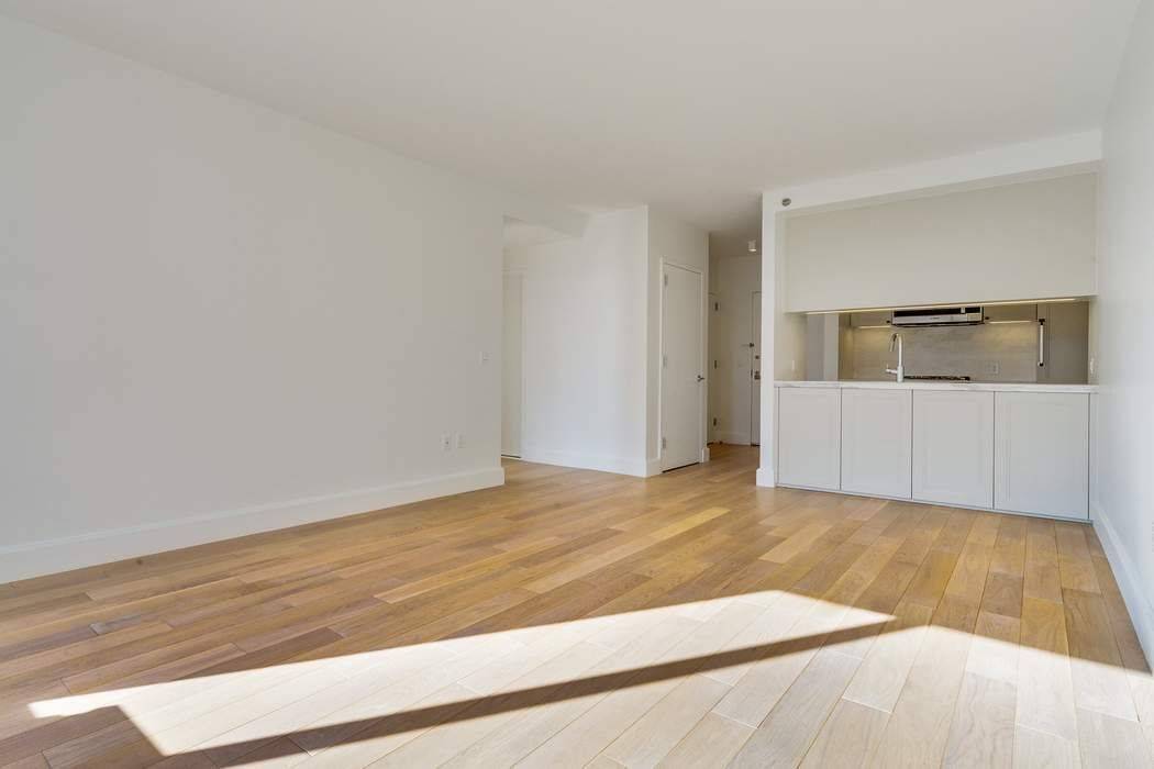 Sunny Spacious One Bedroom Condo Apartment 11E is flooded with sunlight from the eastern exposure with skyline views.