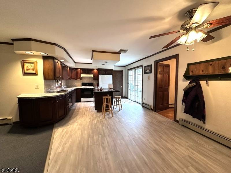 Colonial style Bramhall home with 3 levels close to center of town.