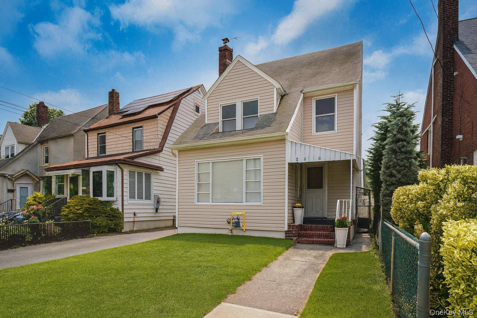 Welcome to 241 10 86th Avenue a beautifully renovated home located on a quiet, tree lined block in the heart of Bellerose.