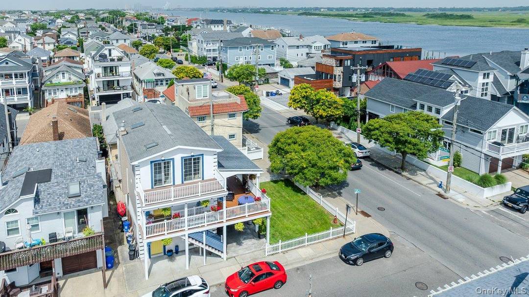 Completely Rebuilt Home on a DOUBLE LOT With Breathtaking Bay and Ocean Views in the West End, Completely Rebuilt 2017, FEMA Compliant, Corner Lot, Beautifully Updated 4 Bedrooms, Open Concept ...