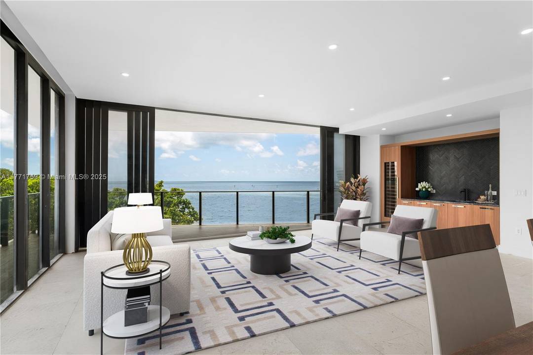 Sophisticated 3 bed, 3. 5 bath residence at The Fairchild Coconut Grove, a boutique waterfront enclave by acclaimed architect Max Strang.