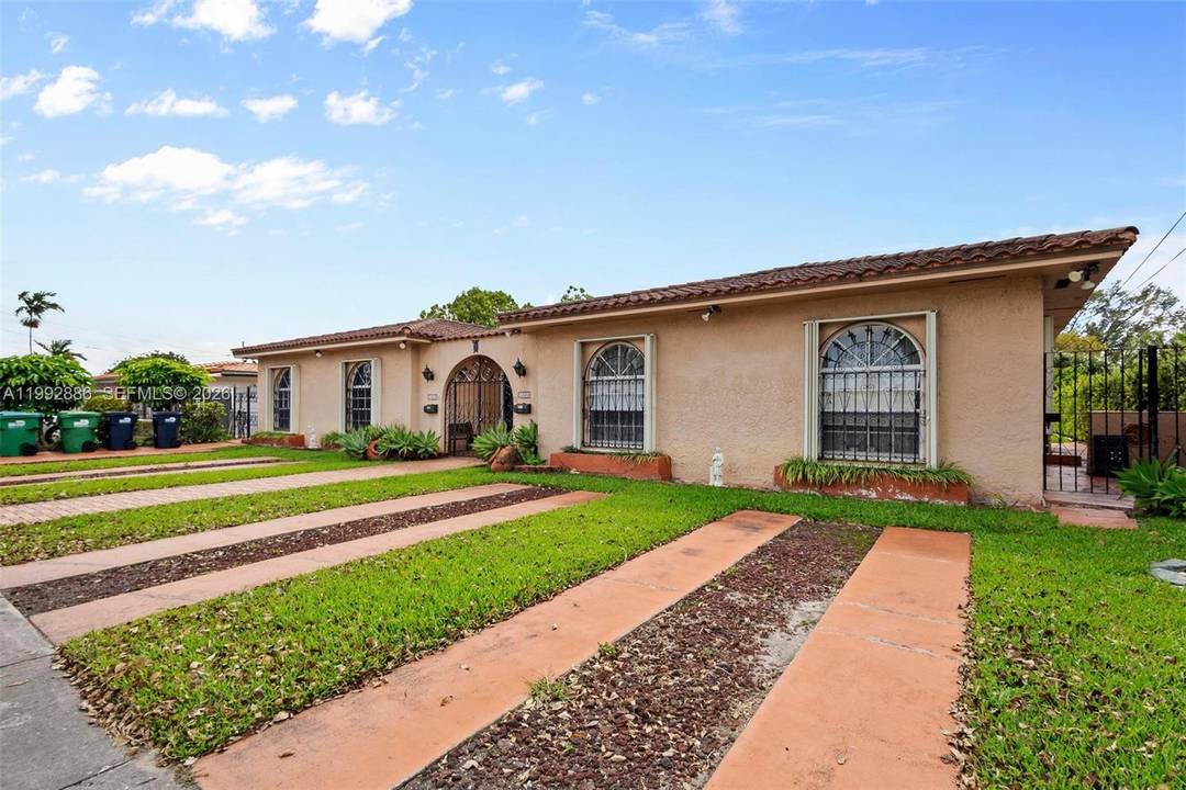 Step into this one of a kind Spanish style duplex designed for both comfortable living and strong income potential.