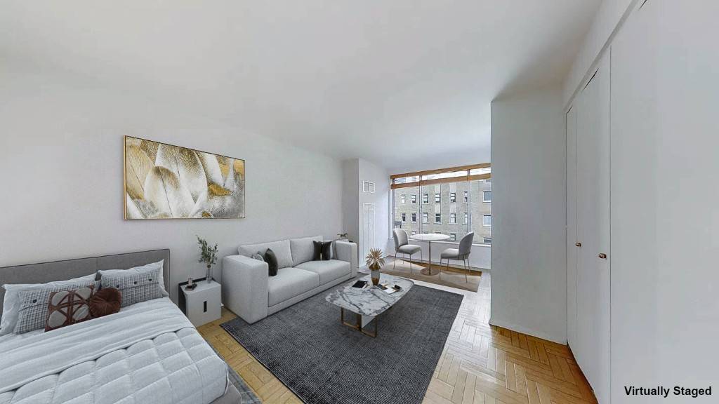 Bright and spacious Studio in the 200 East 69th Street luxury condominium, complete with a fantastic offering of amenities, charming herringbone hardwoods throughout, a marble clad bath, and great closet ...