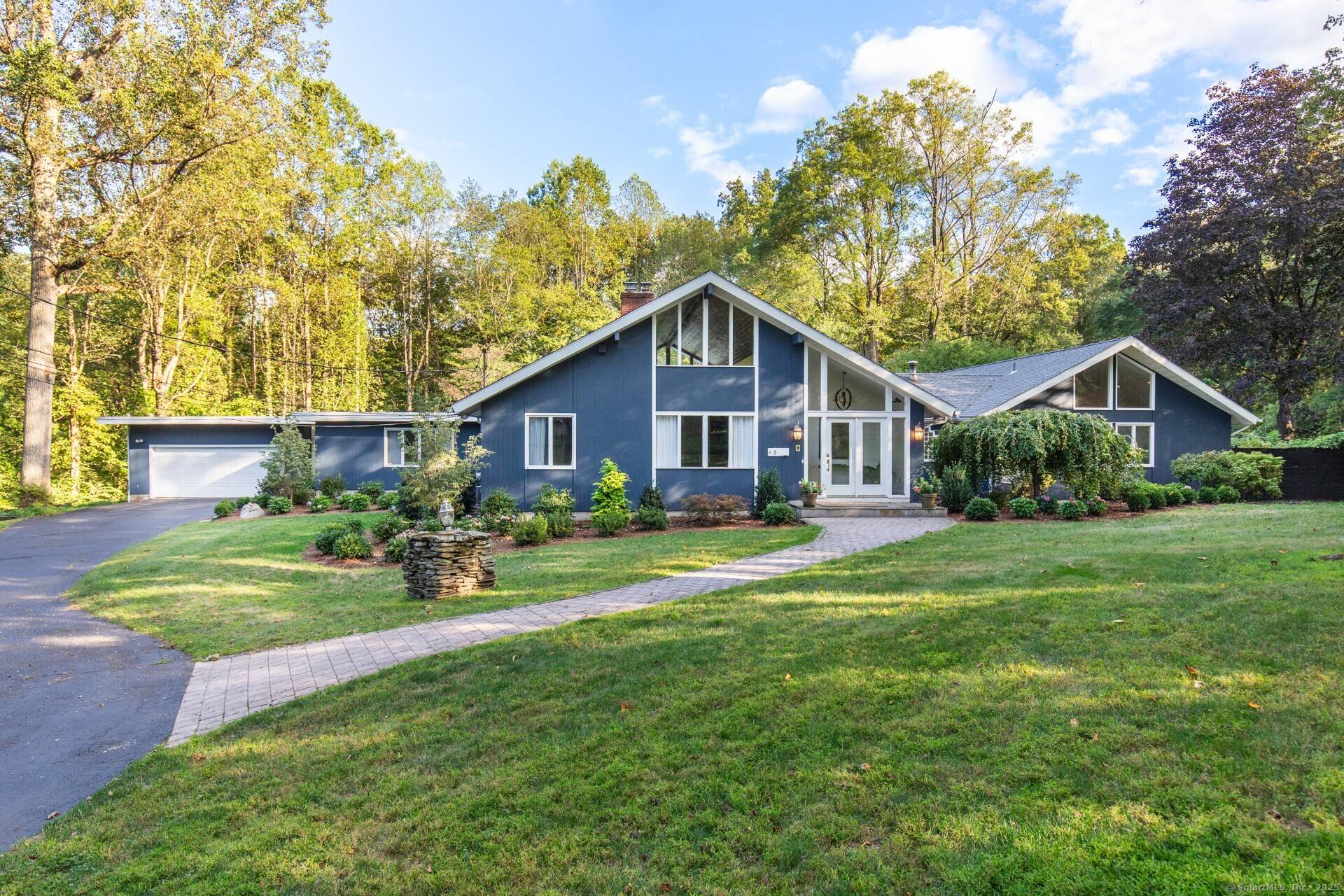 Truly one of a kind ! Breathtaking gardens surround this magnificent contemporary California ranch, perfectly set at the end of a quiet cul de sac in one of Woodbridge's most ...