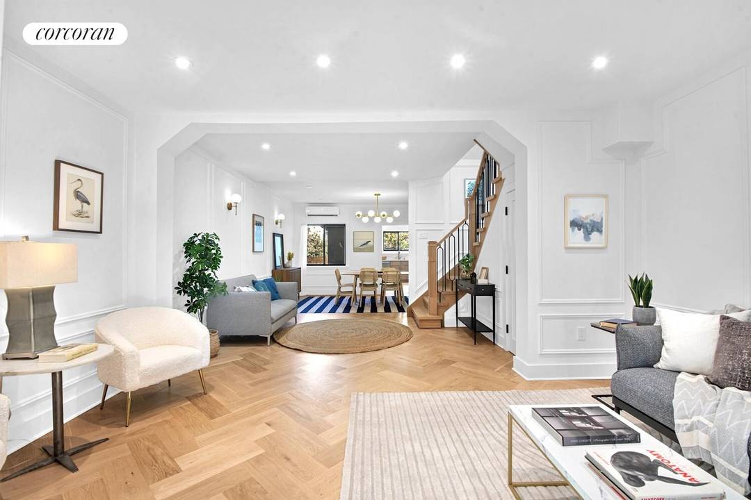 Welcome home to 87 Sherman Street a fully renovated two family townhouse with parking on idyllic Sherman Street !