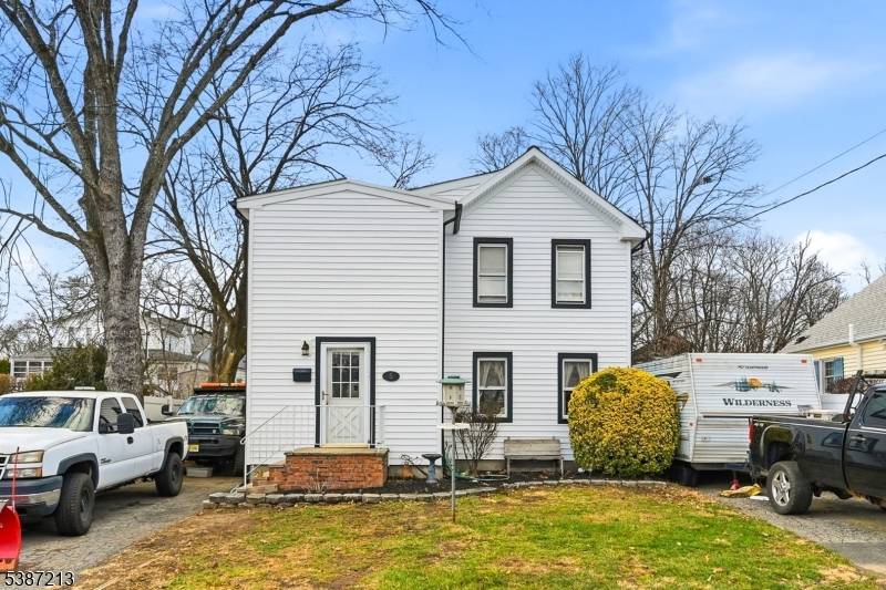 This 4 bedroom, 2 bath Colonial sits on a 50' x 134' level lot.