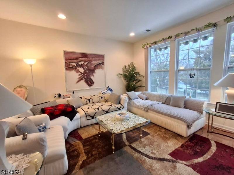 Step into a lifestyle as vibrant as it is relaxed at Spinnaker Pointe home nestled on 50x116 lot in Parlin, NJ.