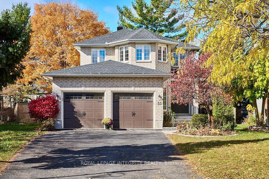 Tucked away on a serene street, this exquisite residence is an absolute dream !