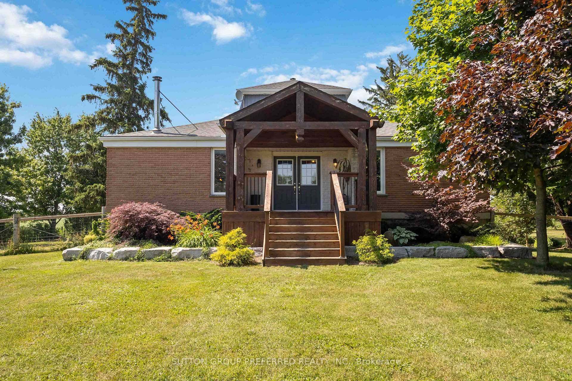 Set on a picturesque 1. 5 acre lot with 1 acre fully fenced this lifestyle property offers privacy and tranquility, surrounded by mature trees and open farm fields.