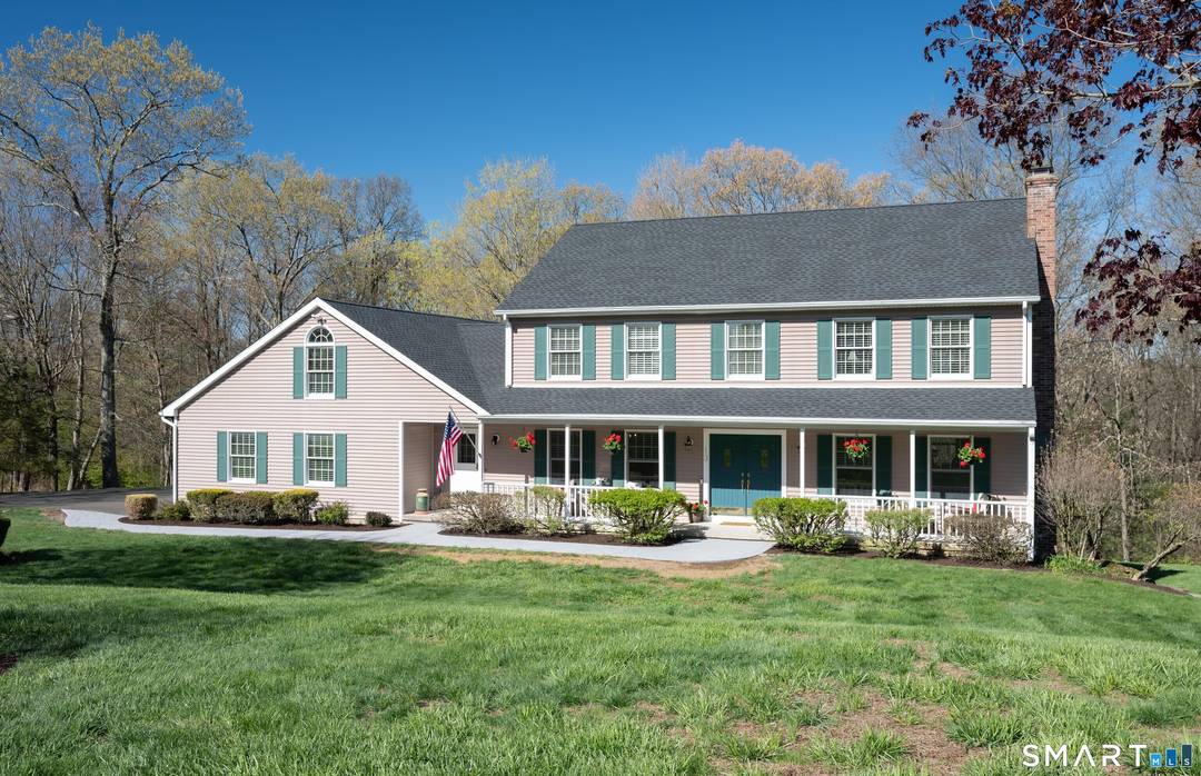 Dreaming of a beautiful colonial home with a farmhouse front porch, located on an idyllic cul de sac in a highly desirable Brookfield neighborhood ?