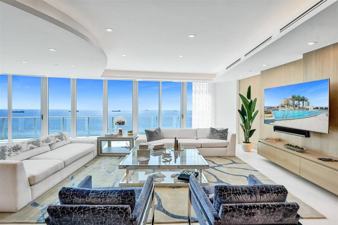 Experience luxury in the sky with this one of a kind, fully furnished two story PENTHOUSE offering unparalleled panoramic views of the Atlantic Ocean.
