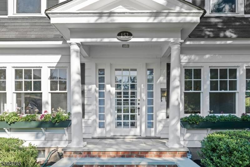 Welcome to 152 Central Avenue, a stunning Center Hall Colonial, perfectly situated on a rare double wide lot in one of Madison's most sought after neighborhoods.