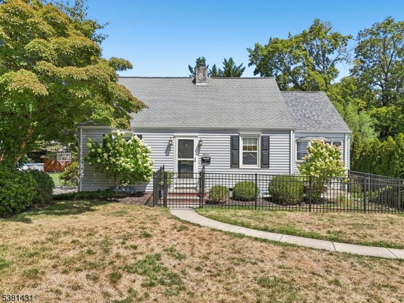 Tucked on a quiet block near The Triangle, 11 Lee Avenue is a beautifully updated Cape that blends timeless charm with modern comfort.