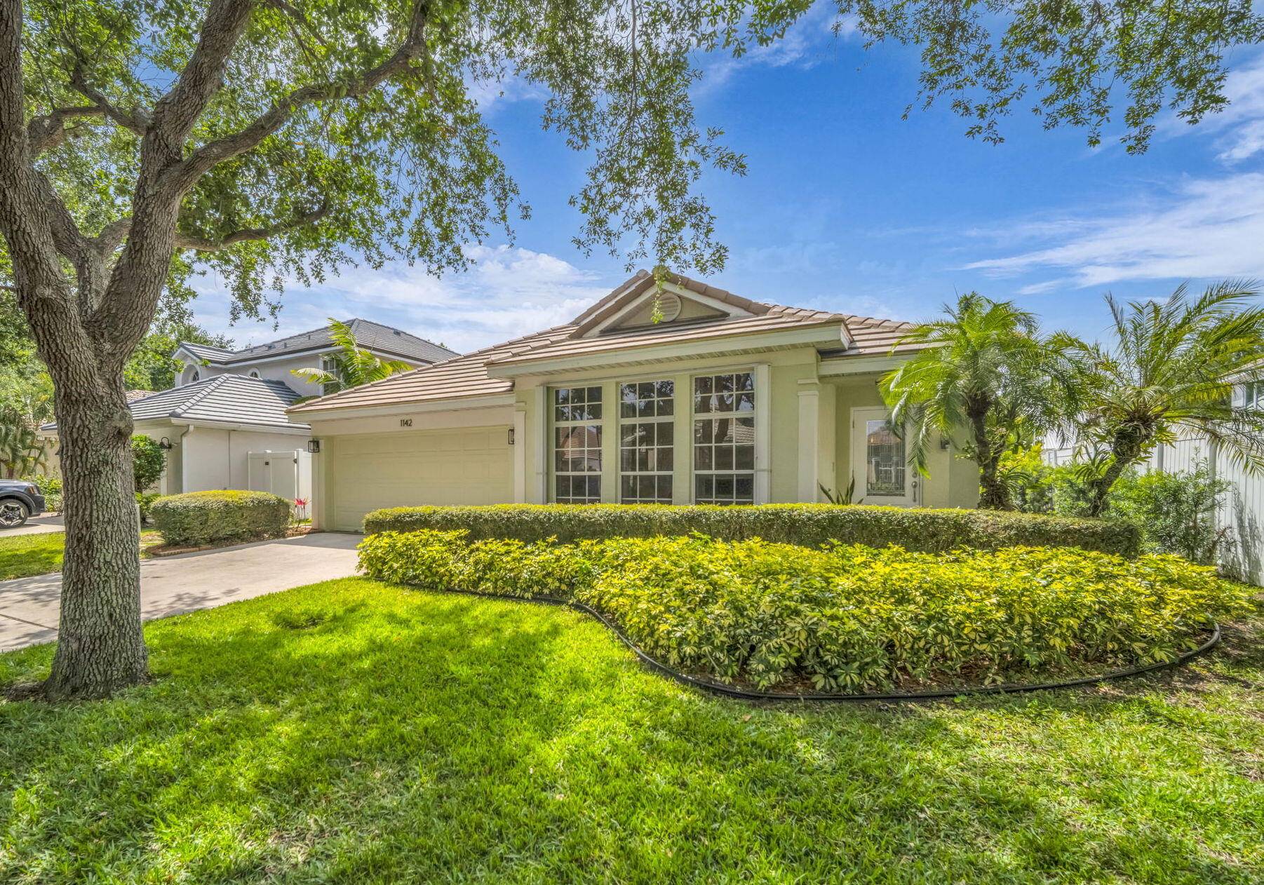 Step into this meticulously maintained and beautifully remodeled 4 bedroom, 2 bath home in the desirable Delray Lakes community.
