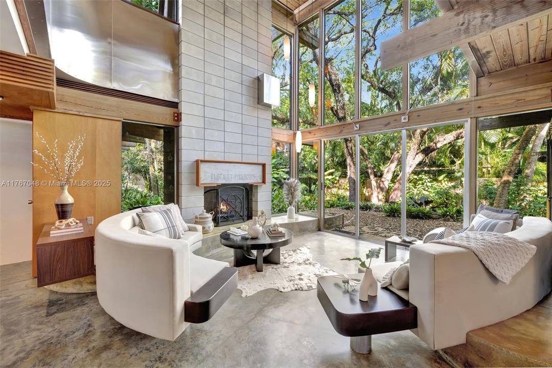 The Fox Den, an architectural masterpiece by Scott DiStefano, blends contemporary design with organic materials in the Frank Lloyd Wright tradition.