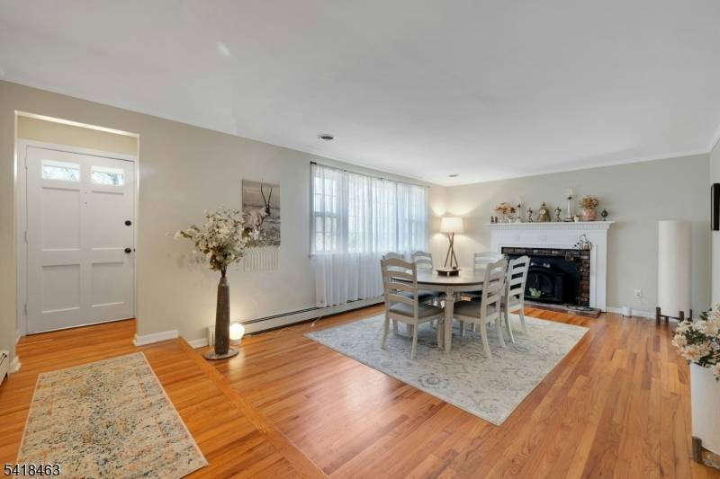 Welcome to this beautifully maintained ranch style home set on a picturesque three quarter acre property.