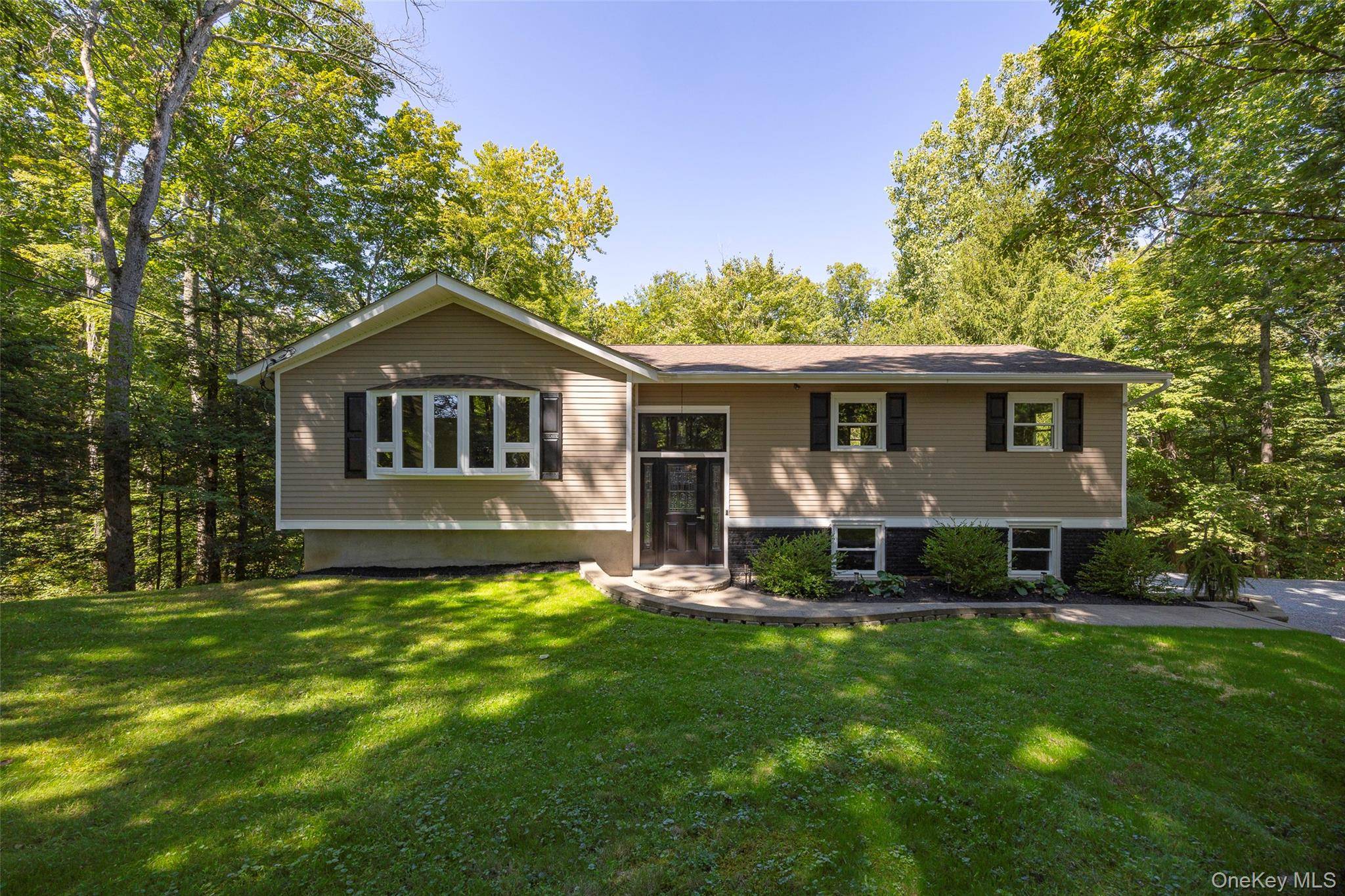 Welcome to this tastefully renovated 3 bedroom, 3 bathroom home, beautifully updated inside and out, and perfectly situated on a private.