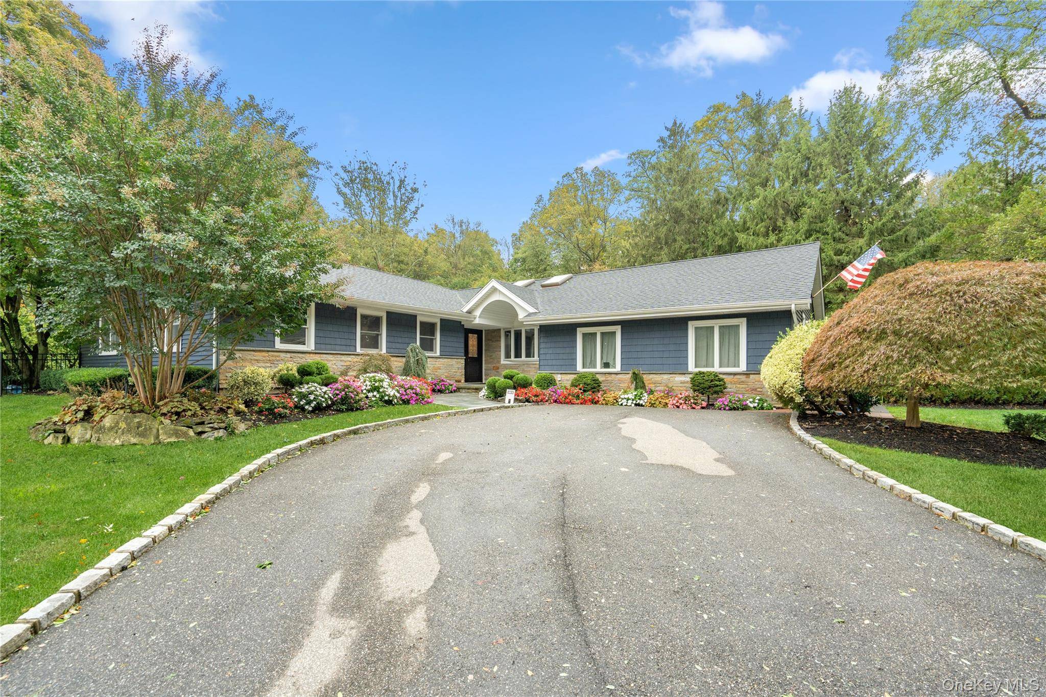Warm and Inviting ! Experience the perfect blend of elegance and comfort in this totally renovated 5 bedroom, 5 bath Ranch on a lush, private acre in the heart of ...