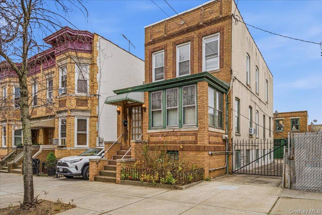 Classic, fully detached multi family in the heart of Ridgewood.