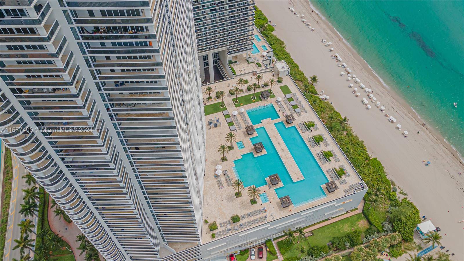Experience the epitome of luxury living in this fully remodeled residence, situated within an oceanfront building.