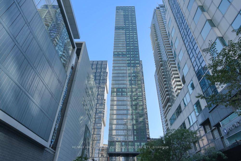 High floor southwest corner suite at Empire Maverick with sweeping CN Tower, city amp ; lake views.